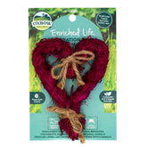 Oxbow Celebration Heart toy in action encouraging pawing and exploring for daily enrichment