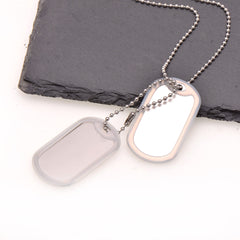 Paialco stainless steel dog tags shown with blank engraving area for personalized lettering.