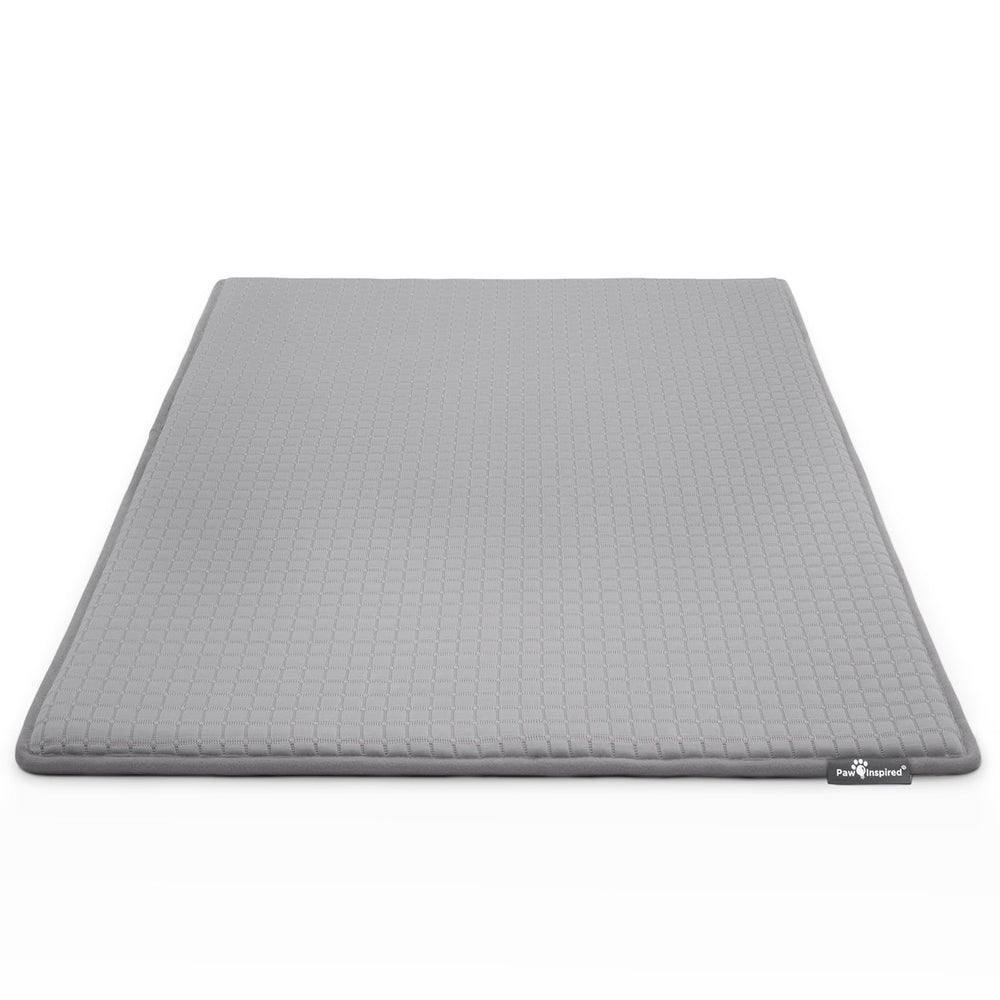 Paw Inspired cooling-orthopedic crate pad inside kennel for dog comfort and joint support.