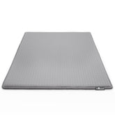 Paw Inspired cooling-orthopedic crate pad inside kennel for dog comfort and joint support.