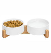 Pawsome ceramic cat and small dog bowls on a wood stand for tidy meals.