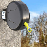 PAWSTATION 30ft wall-mount retractable cable for yard freedom and secure containment