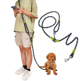 Pawstrip hands-free dog leash worn on the shoulder for comfortable city runs.