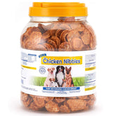 PCI Chicken Nibble canister showing premium single-ingredient dog treats for training rewards.