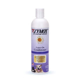 Pet King Brands ZYMOX leave-in conditioner bottle closeup for smooth, hydrated coats.