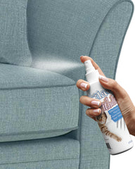 Pet MasterMind Claw Withdraw sprayed on fabric sofa for easy training.