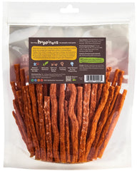 Pet 'n Shape Chik 'n Sweet Potato Stix treat piece showing chewy texture for training.