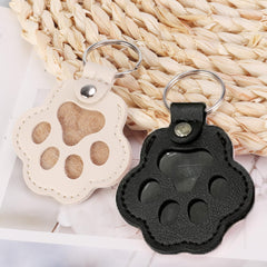 Pet paw leather keychain design featuring durable charm for daily use.