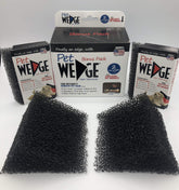 Pet Wedge hair remover cleans car interiors for easy fur cleanup.