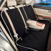 Petalage dog car seat cover waterproof barrier protects seats from mud and spills.