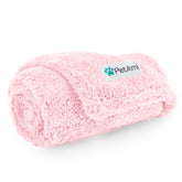 PetAmi fluffy waterproof blanket on sofa protects furniture from spills.