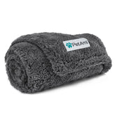 PetAmi fluffy waterproof blanket on a sofa protects furniture from spills and pet messes.