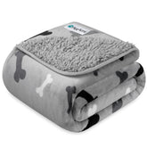 PetAmi waterproof dog blanket protects couches from spills during nap time.
