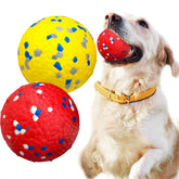 Petcare indestructible dog ball yellow promotes dental gum massage during play.