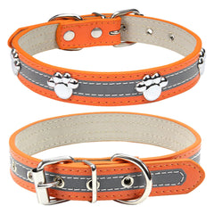 Petcare reflective dog collar orange front view highlights paw rivet studs for visibility