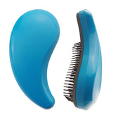 PetJoyHaven comma-shaped small-dog-brush blue front—gentle grooming for silky coats.
