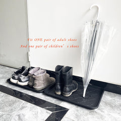 PetLike boot tray under sink catches drips and plant water.