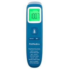PetMedics infrared thermometer aimed at dog's ear for fast reading.