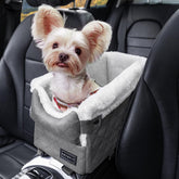 PETSFIT center-console dog car seat installed in grey for stable in-vehicle seating.