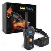 PetSpy shock collar front view with remote for precise training in yard and park.