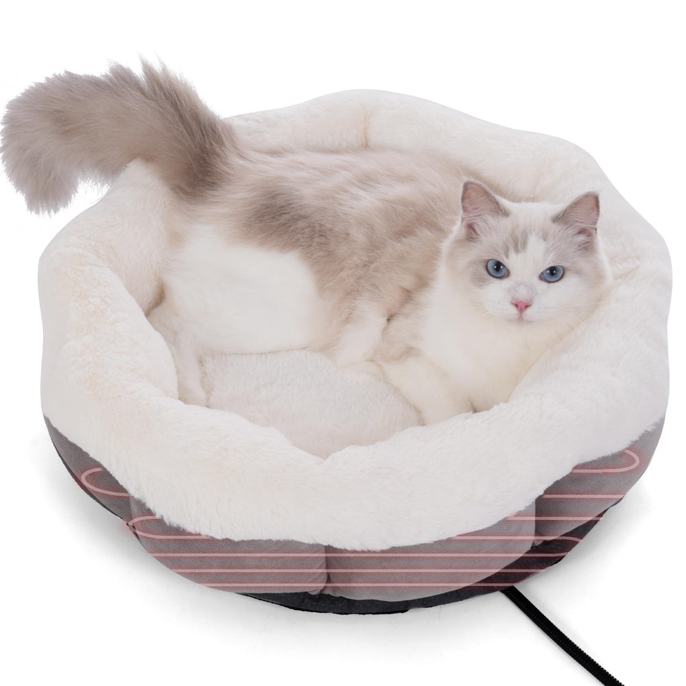Petvolve heated cat bed indoor round view showing cozy warmth and compact shape for small pets.