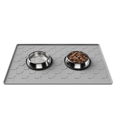 Pieviev raised-edge dog cat mat keeps spills contained for cleaner floors.