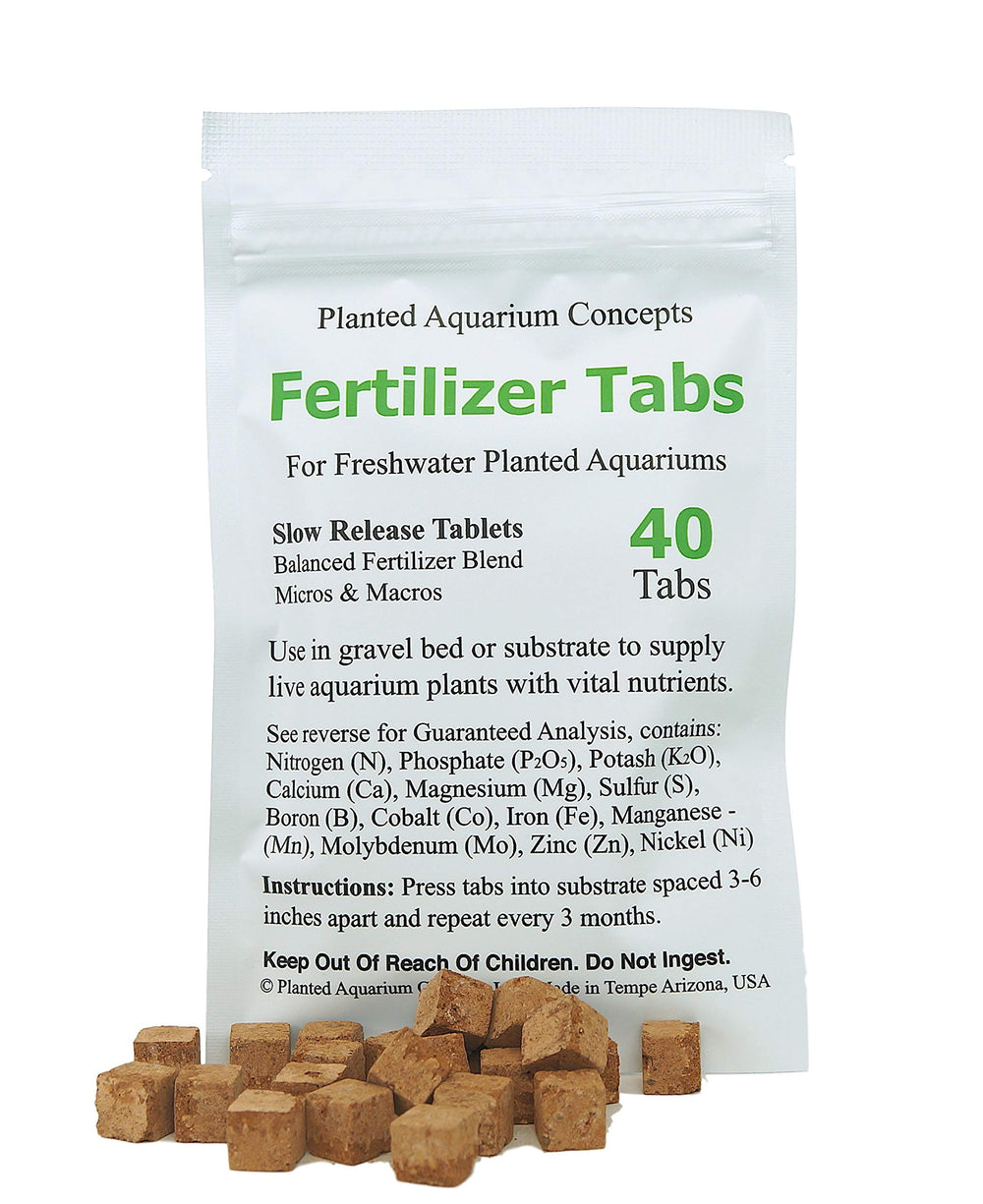 Planted Aquarium Concepts root fertilizer tabs applied near plant roots for steady growth.