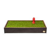 Porch Potty artificial grass self-draining closeup shows fast drainage for easy cleanup.