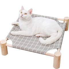 Pozico elevated cat bed with wooden frame provides sturdy support for restful naps