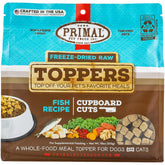 Primal Pet Foods dog toppers with fish pack open; boosts flavor and omega-3 for training sessions.