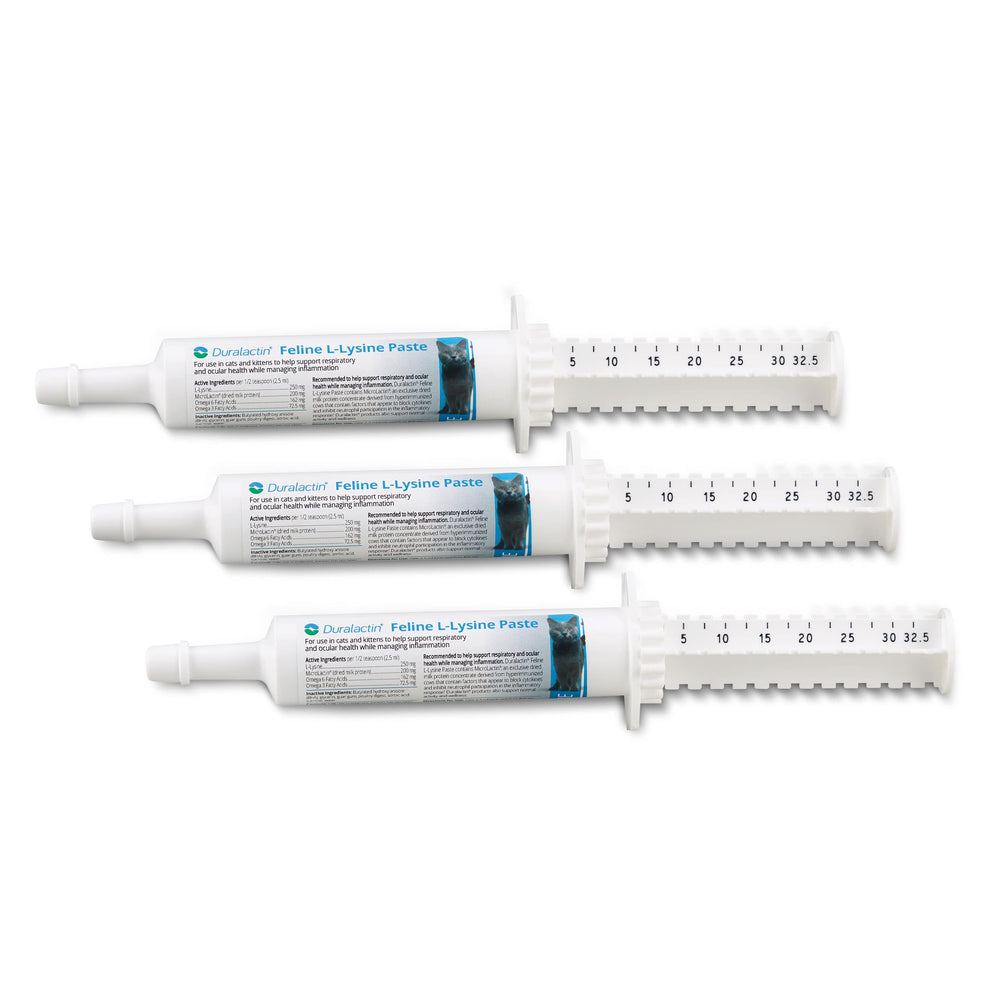 PRN Duralactin feline paste bottle with dial-dose syringe enables easy administration.