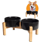 PTOBER elevated ceramic dog bowl set on a bamboo stand for comfortable meals and reduced neck strain.