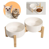 PTOBER elevated ceramic dog bowl set on bamboo stand for convenient feeding