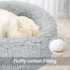 Qinxuepet donut bed raised edges provide gentle head support for restful naps.