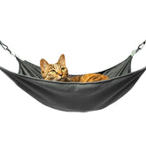 QIPAN cat hammock in cage with washable dual-side mat for year-round comfort.