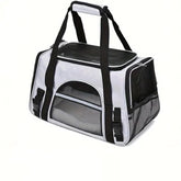 QQLe pet carrier with breathable mesh panels for cooling airflow during trips.