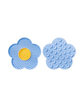 QWINEE lick mat for dogs, flower design in blue, supports portion control.