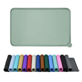 Reopet waterproof pet feeding mat with anti-slip base to keep bowls stable.