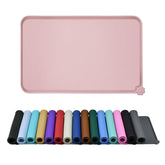 Reopet waterproof pet feeding mat with high-raised edges keeps spills contained during meals.