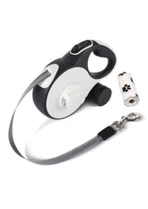 Retractable dog leash with LED light 16ft illuminating night walks for safety.