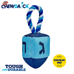 Rite Lite Dreidel Dog Toy top view highlights vibrant dual-sided colors for festive play.