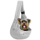 Riuja adjustable dog carrier sling gray fabric offers breathable comfort during travel.