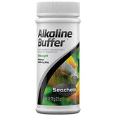 Seachem Alkaline Buffer bottle being poured to adjust pH in a freshwater tank.