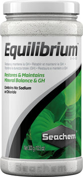 Seachem Equilibrium bottle closeup shows mineral blend supporting healthy planted tanks.