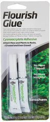 Seachem Flourish Glue bottle closeup highlights fast plant attachment for aquariums.