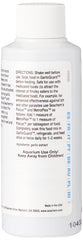 Seachem Garlic Guard label close-up emphasizes reef-safe, all-natural garlic flavor enhancer.