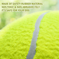 SenseYo Pomeat bright colored giant tennis ball in use outdoors