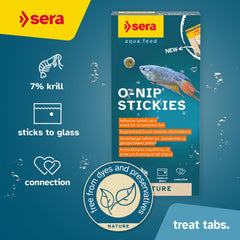 Close-up of Sera O-Nip Nature tabs ready to stick to glass.