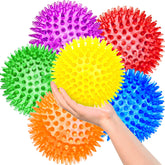 SHARLOVY 3.5-inch large dog ball with squeaker and spikes promotes active play and dental engagement.