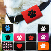 SilenTags Dapper Dog Silencer red paw closeup reduces jangling on collars.